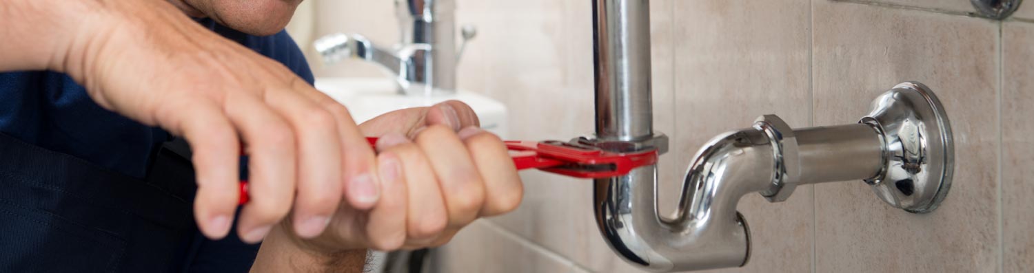 Plumber Fixing Tap